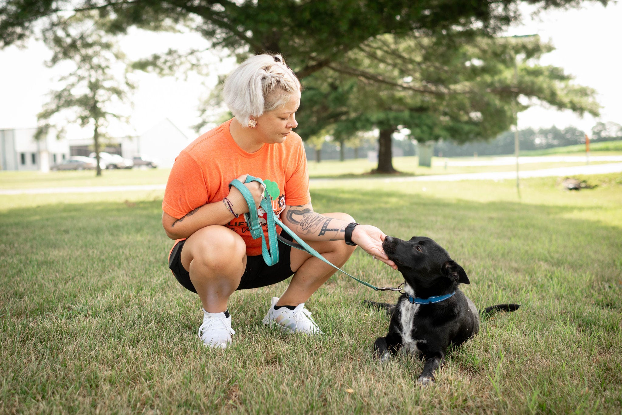 lift the community day 2023 - humane society tmh employee volunteers at humane society