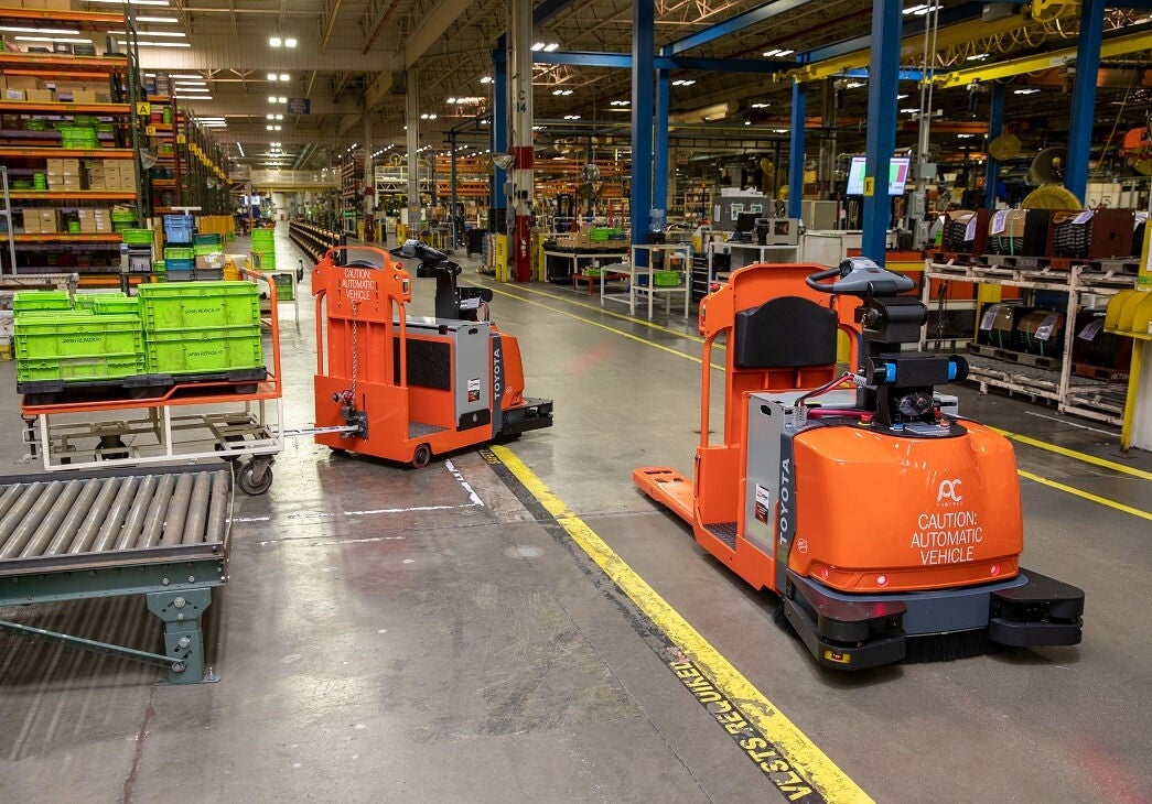 automated guided forklifts running on maunfacturing floor
