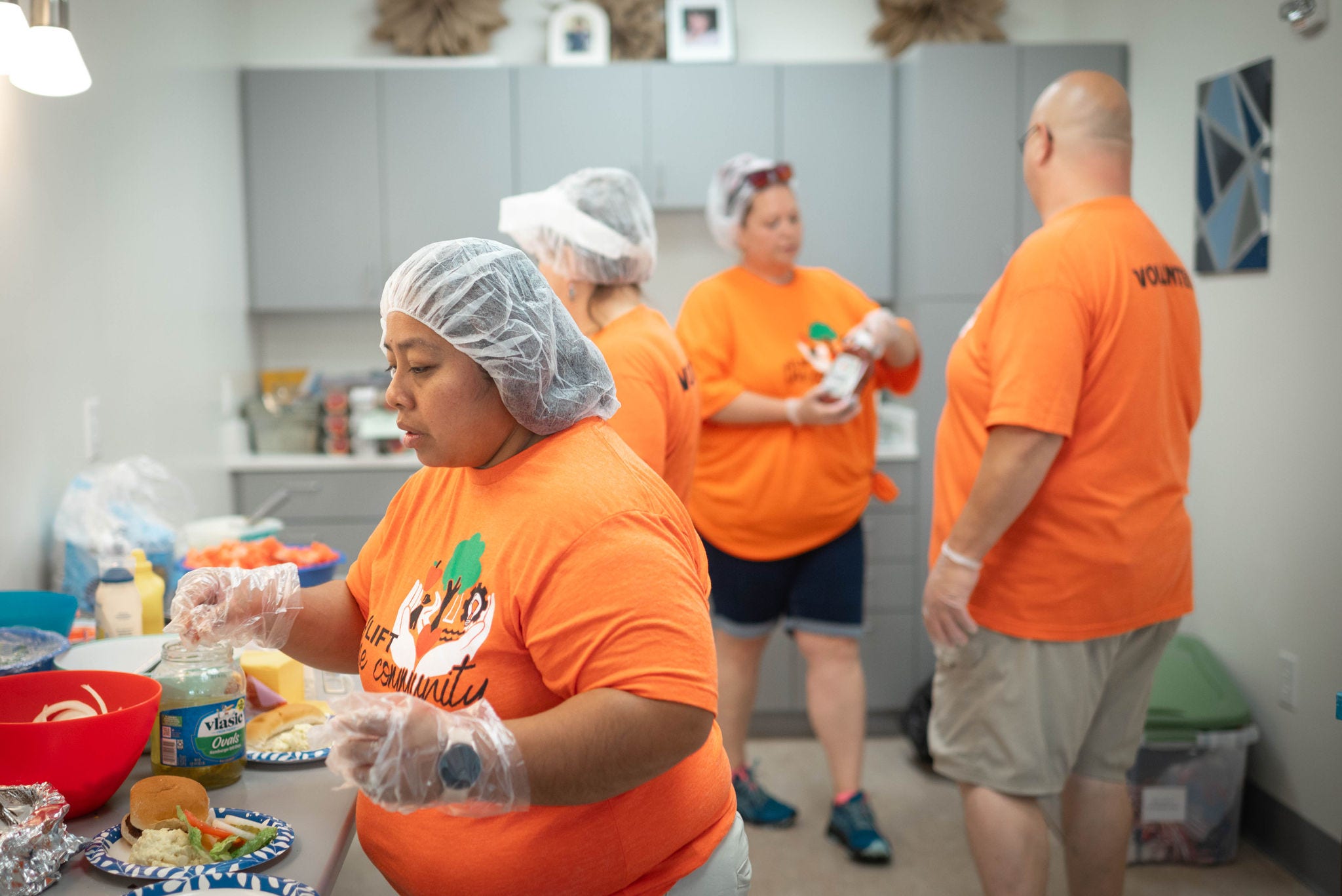 lift the community day 2023 - just friends tmh employee volunteers at just friends